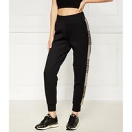 Dresy damskie - GUESS Spodnie dresowe | Regular Fit - miniaturka - grafika 1