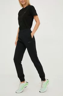 Spodnie damskie - Jack Wolfskin spodnie dresowe bawełniane damskie kolor czarny gładkie - grafika 1