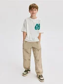 Spodnie i spodenki dla chłopców - Reserved - Bawełniane spodnie parachute - beżowy - miniaturka - grafika 1