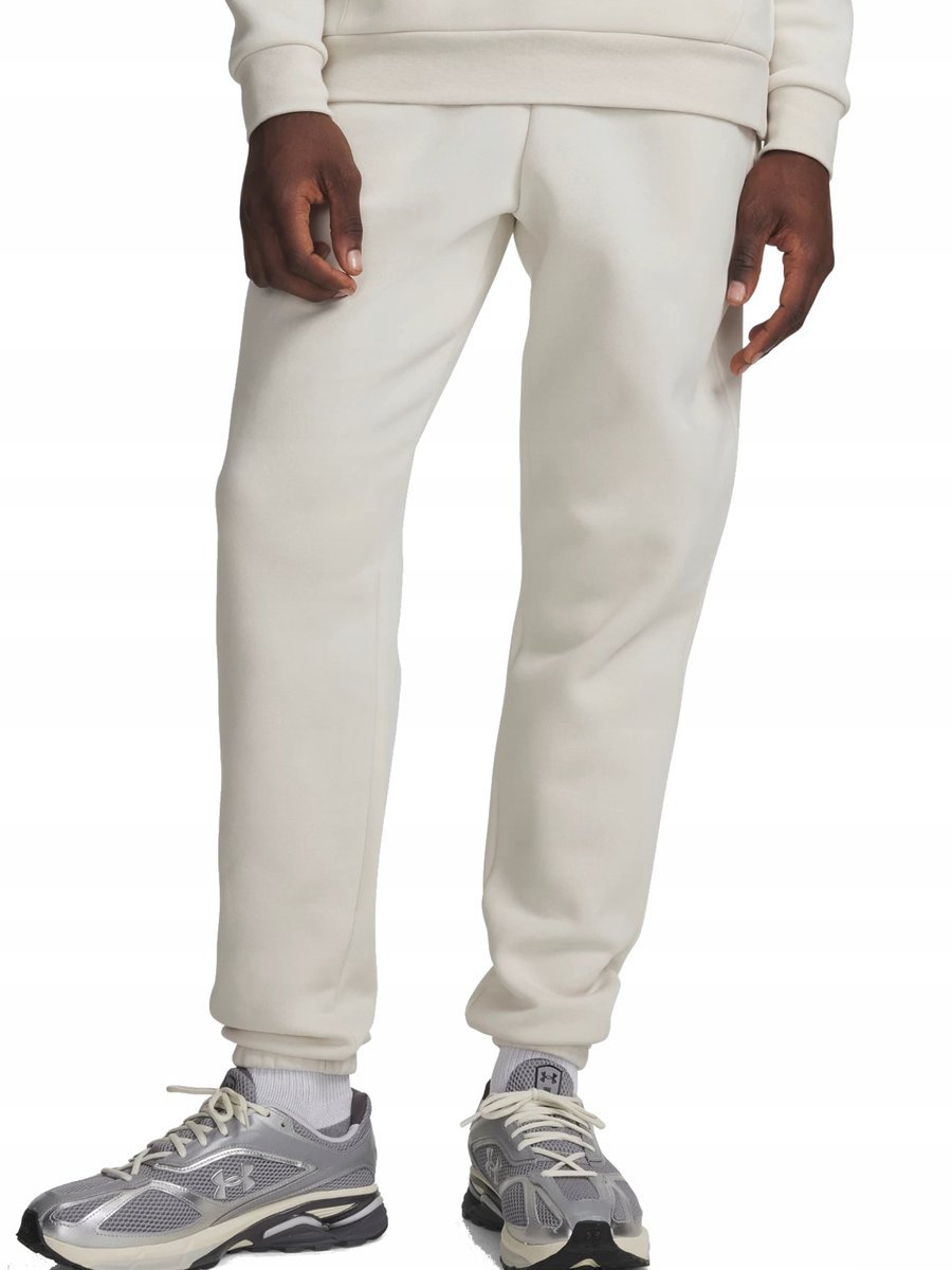SPODNIE męskie UNDER ARMOUR 1373882-110 dresowe beżowe bawełniane ciepłe S S