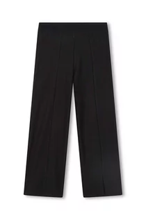 Spodnie i spodenki dla dziewczynek - HUGO legginsy dziecięce kolor czarny gładkie - Hugo - grafika 1