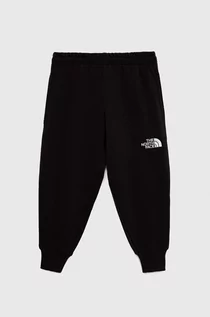 Spodnie damskie - The North Face spodnie dresowe bawełniane dziecięce kolor czarny z nadrukiem - grafika 1