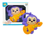 Zabawki interaktywne dla dzieci - ZABAWKOWA GRAJĄCA MAŁPKA FIOLETOWA - miniaturka - grafika 1
