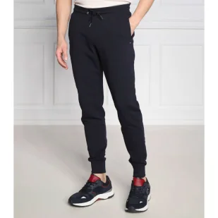 Tommy Hilfiger Spodnie dresowe | Regular Fit - Dresy męskie - miniaturka - grafika 1