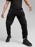 Spodnie sportowe męskie - Puma Spodnie dresowe "Fit Hybrid" w kolorze czarnym - miniaturka - grafika 1