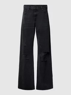 Spodnie damskie - Jeansy o luźnym kroju z przetarciami model ‘Judee’ - grafika 1