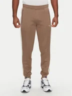 Spodnie sportowe męskie - Puma Spodnie dresowe T7 Always On 629588 Brązowy Regular Fit - miniaturka - grafika 1