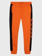 Spodnie i spodenki dla dziewczynek - Guess Spodnie dresowe L3RQ24 KA6R3 Pomarańczowy Regular Fit - miniaturka - grafika 1