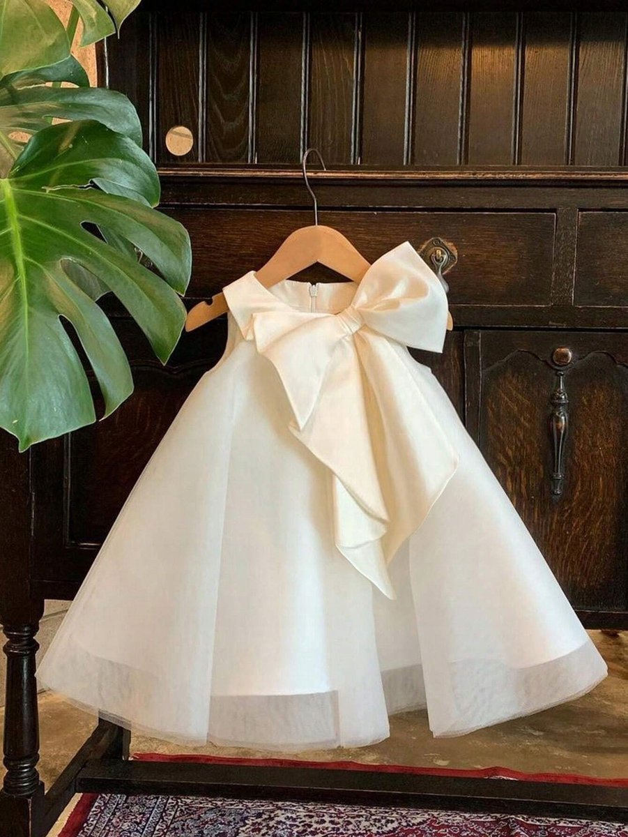 SHEIN ELEGANCKA BIAŁA SUKIENKA ROZKLOSZOWANA Z KOKARDĄ 122-128 11LA