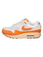 Trampki damskie - Nike Skórzane sneakersy "Air Max 1" w kolorze kremowo-pomarańczowym - miniaturka - grafika 1