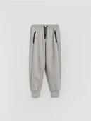 Spodnie i spodenki dla chłopców - Reserved - Bawełniane spodnie jogger - jasnoszary - miniaturka - grafika 1