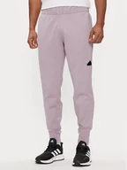 Spodnie sportowe męskie - adidas Spodnie dresowe Z.N.E. Winterized IR5245 Fioletowy Regular Fit - miniaturka - grafika 1