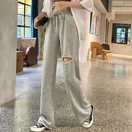 Spodnie damskie - Dresy z dziurą - Szary - miniaturka - grafika 1