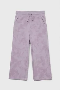 Spodnie i spodenki dla dziewczynek - GAP spodnie dresowe dziecięce kolor fioletowy wzorzyste - Gap - grafika 1