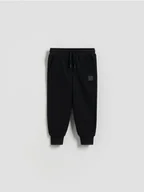 Spodenki dla niemowląt - Reserved - Dresowe joggery - czarny - miniaturka - grafika 1