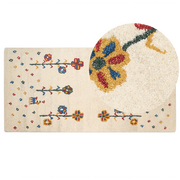 Dywany - Dywan wełniany ze wzorem w kwiaty 80x150 cm beżowy HUSUNLU - miniaturka - grafika 1
