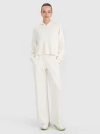 Spodnie sportowe damskie - 4F Spodnie dresowe z modalem z szerokimi nogawkami damskie - białe XXL - miniaturka - grafika 1