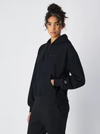 Bluzy damskie - Champion Bluza w kolorze czarnym - miniaturka - grafika 1