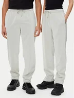 Kurtki damskie - Rains Spodnie przeciwdeszczowe Unisex 18560 Beżowy Regular Fit - miniaturka - grafika 1