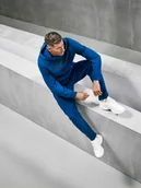 Spodnie sportowe męskie - 4F Spodnie dresowe joggery męskie 4F x Robert Lewandowski - granatowe XXL - miniaturka - grafika 1