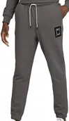 Spodnie męskie - Spodnie dresowe męskie Puma Pivot Special S szare - miniaturka - grafika 1