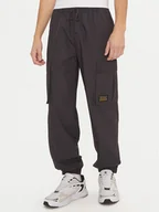 Spodnie sportowe męskie - Champion Spodnie dresowe 220415 Czarny Loose Fit - miniaturka - grafika 1