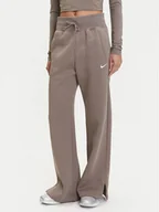 Spodnie sportowe damskie - Nike Spodnie dresowe Phoenix DQ5615 Brązowy Regular Fit - miniaturka - grafika 1