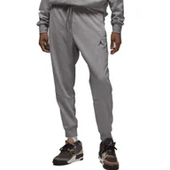 Spodnie sportowe damskie - Spodnie Dri-FIT Sport Crossover Rozmiar XL Szary - DQ7332-091 - miniaturka - grafika 1