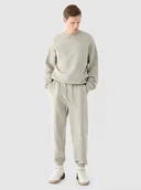 Spodnie sportowe męskie - Męskie spodnie dresowe joggery Outhorn OTHWAW24TTROM1218 - szare - miniaturka - grafika 1