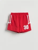 Spodnie i spodenki dla dziewczynek - Reserved - Szorty z nadrukiem - czerwony - miniaturka - grafika 1