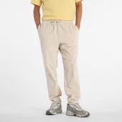 Spodnie męskie - Spodnie męskie New Balance MP53521TWF beżowe - miniaturka - grafika 1