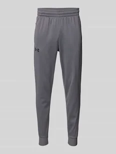 Spodnie dresowe o kroju slim fit z nadrukiem z logo - Spodnie sportowe męskie - miniaturka - grafika 1