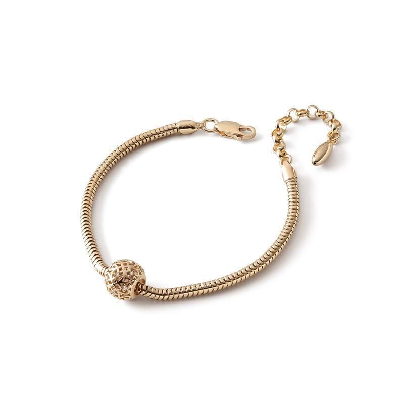 Bransoletka z ażurową kulką z cyrkoniami typu beads, srebro 925 w złotym pokryciu