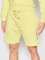 Spodnie sportowe męskie - Tommy Hilfiger Szorty sportowe Logo MW0MW22198 Żółty Regular Fit - miniaturka - grafika 1