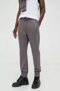 Spodnie męskie - G-Star Raw spodnie dresowe kolor fioletowy gładkie - grafika 1