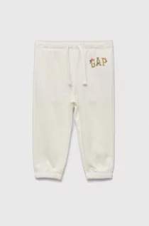 Spodnie i spodenki dla dziewczynek - GAP spodnie dresowe dziecięce kolor biały z aplikacją - Gap - grafika 1