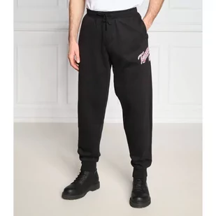 Tommy Jeans Spodnie dresowe COLLEGE 85 | Regular Fit - Dresy męskie - miniaturka - grafika 1