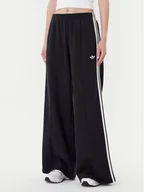 Spodnie sportowe damskie - adidas Spodnie dresowe adicolor 3-Stripes JV7473 Czarny Wide Leg - miniaturka - grafika 1