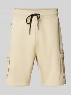Spodnie sportowe męskie - Szorty z dzianiny dresowej o kroju regular fit z kieszeniami cargo model ‘ICONS’ - grafika 1