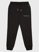Spodnie i spodenki dla dziewczynek - Calvin Klein Jeans Spodnie dresowe Logo IG0IG01509 Czarny Relaxed Fit - miniaturka - grafika 1