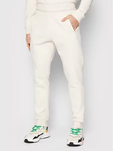 Adidas Spodnie dresowe adicolor Essentials HE9410 Beżowy Slim Fit - Spodnie sportowe męskie - miniaturka - grafika 1