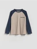 Bluzki dla chłopców - Reserved - Bawełniany longsleeve z nadrukiem - kremowy - miniaturka - grafika 1