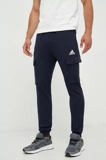 Spodnie męskie - adidas spodnie dresowe męskie kolor granatowy gładkie - grafika 1