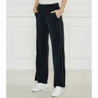 Dresy damskie - EA7 Spodnie dresowe flare fit - miniaturka - grafika 1