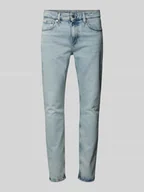 Spodnie męskie - Jeansy o kroju slim tapered fit z detalem z logo - miniaturka - grafika 1