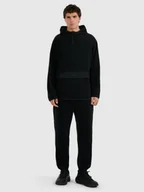 Spodnie sportowe męskie - 4F Spodnie dresowe polarowe męskie - czarne S - miniaturka - grafika 1