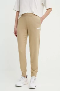 Spodnie damskie - Puma spodnie dresowe kolor beżowy gładkie 586843 - grafika 1