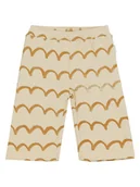 Spodenki dla niemowląt - Noppies Spodnie dresowe "Tanton" w kolorze beżowym - miniaturka - grafika 1