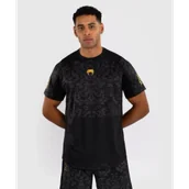 Kimona, stroje i obuwie - Venum x Ilia Topuria Unmatched Koszulka Techniczna Treningowa Dry Tech Black/Gold - miniaturka - grafika 1