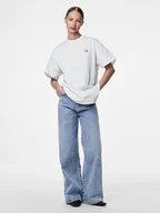 Koszulki i topy damskie - Pieces Koszulka w kolorze białym - miniaturka - grafika 1